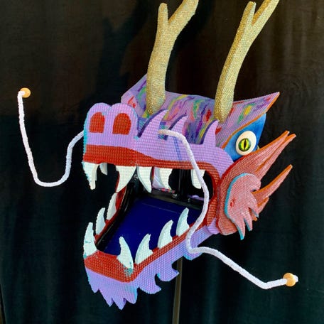 The head of a chinese dragon puppet