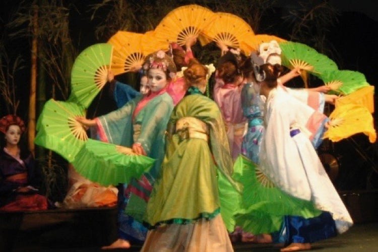 Girls doing a fan dance