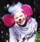 A child costumed as a mouse wearing a crown