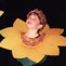 A child in sunflower costume