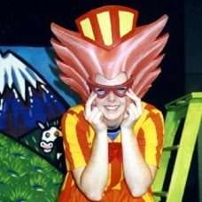 An actor in brightly coloured costume in Calico show The Big Chips