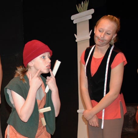 A tradesman points out he can't play a woman in the play because he is growing a beard
